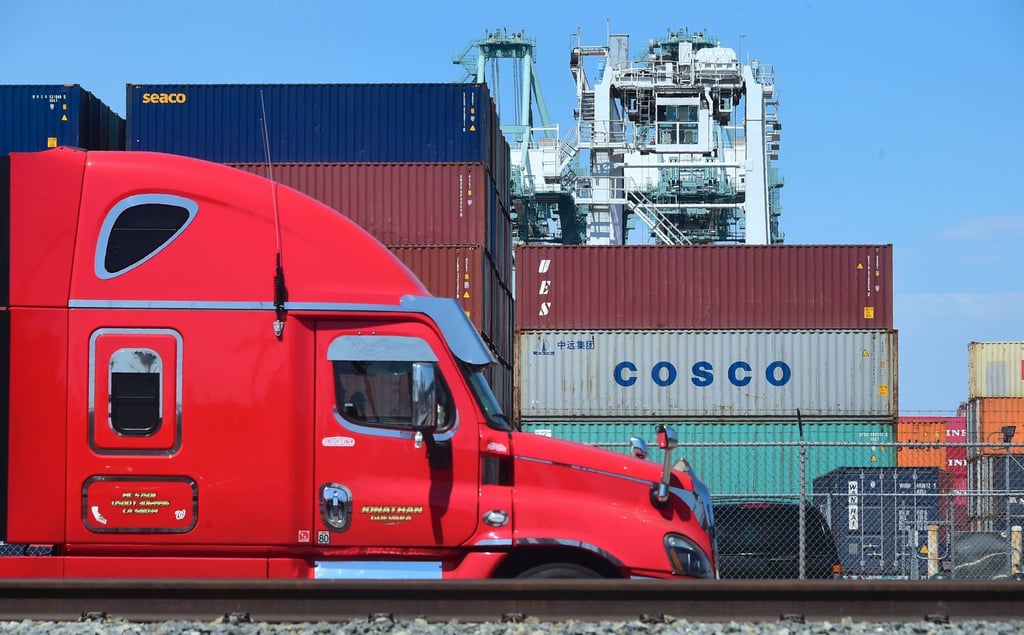 A container delivery truck passes containers stacked at the Port of Long Beach in Long Beach, California in July 2018, including one from COSCO, the Chinese state-owned shipping and logistics company. Photo: AFP A container delivery truck passes containers stacked at the Port of Long Beach in Long Beach, California in July 2018, including one from COSCO, the Chinese state-owned shipping and logistics company. Photo: AFP