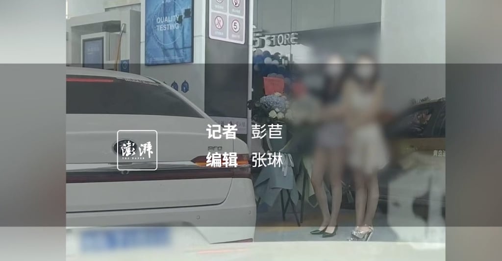 Bikini-clad girls work at a petrol station and cause traffic problems. Photo: Handout Bikini-clad girls work at a petrol station and cause traffic problems. Photo: Handout