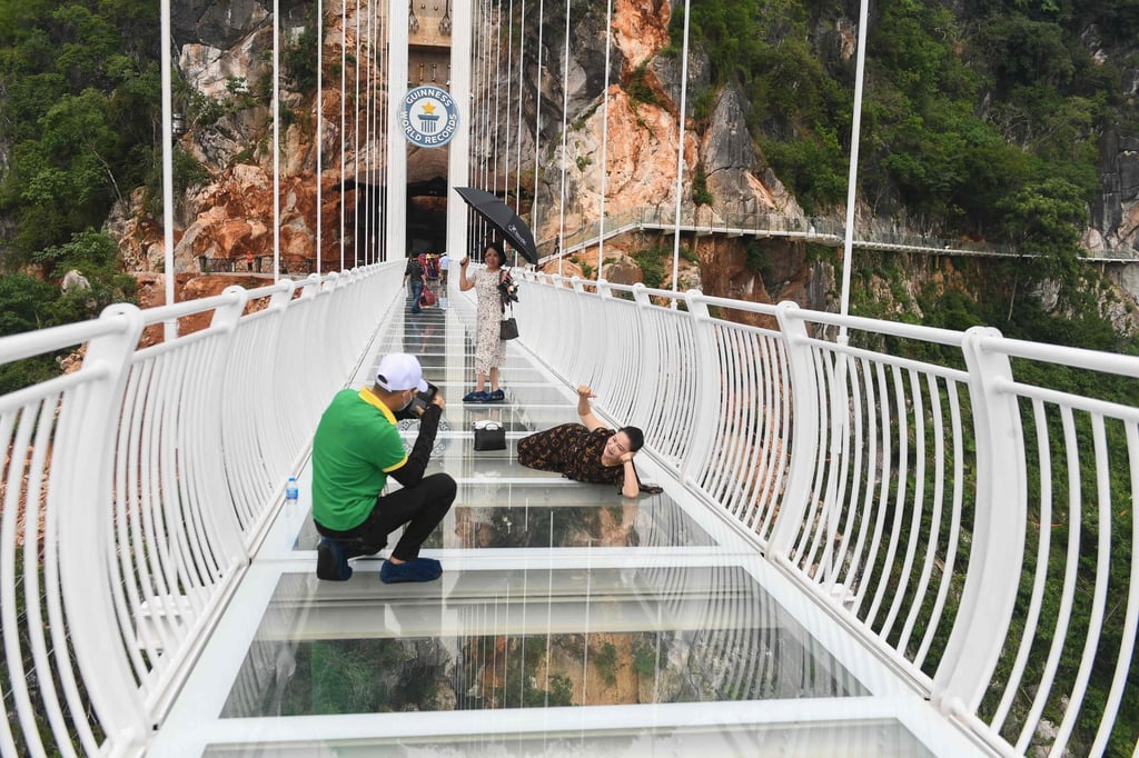 The Bach Long glass bridge offers a real adrenaline rush to adventure seekers. Photo: AFP The Bach Long glass bridge offers a real adrenaline rush to adventure seekers. Photo: AFP