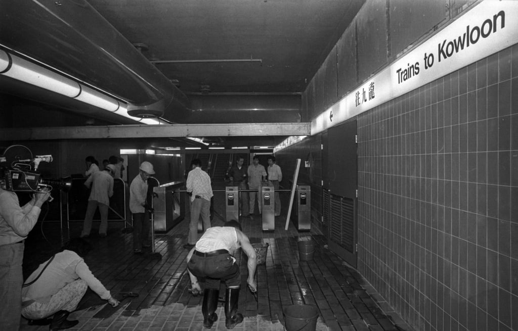 Workers prepare the opening of the KCR/MTR interchange station at Kowloon Tong. Photo: Sam Chan Workers prepare the opening of the KCR/MTR interchange station at Kowloon Tong. Photo: Sam Chan