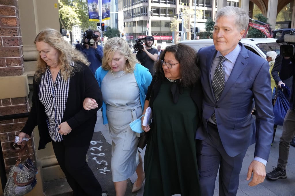 Scott Johnson’s family arrive at the Supreme Court in Sydney for a sentencing hearing for his murder. Photo: AP