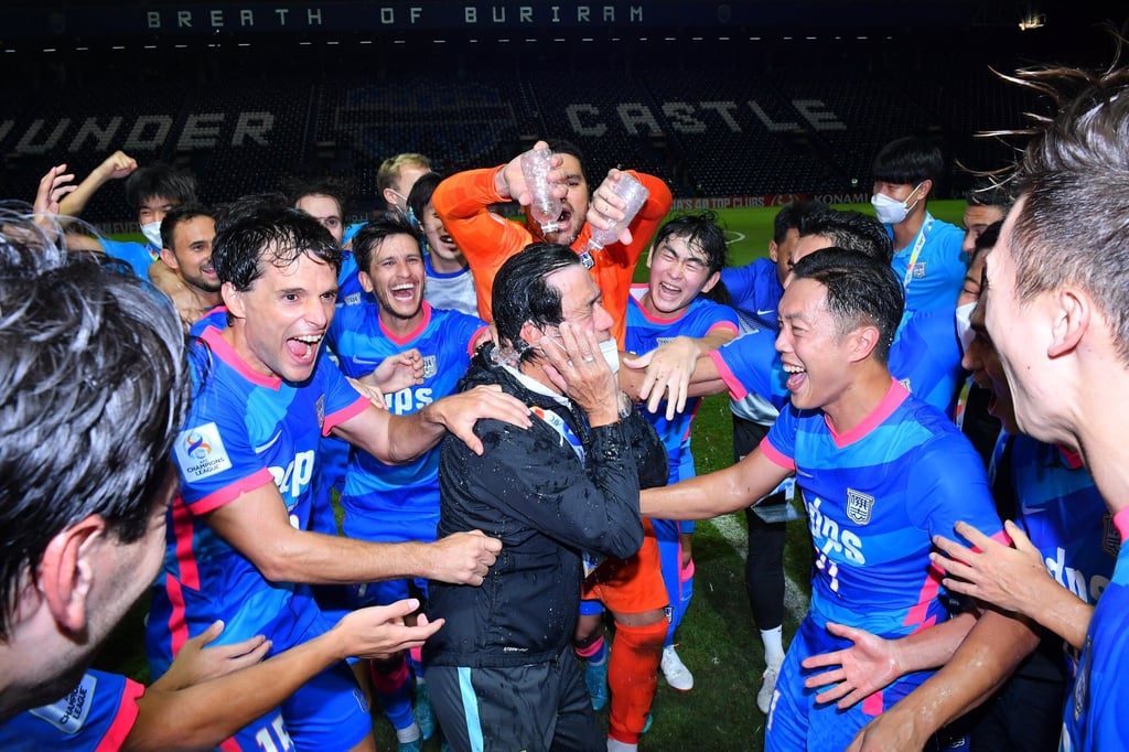 Kitchee head coach Chu Chi-kwong greeted by his players after holding Vissel Kobe to a 2-all draw at Buriram Stadium to reach the AFC Champions League round of 16. Photo: Getty Images Kitchee head coach Chu Chi-kwong greeted by his players after holding Vissel Kobe to a 2-all draw at Buriram Stadium to reach the AFC Champions League round of 16. Photo: Getty Images