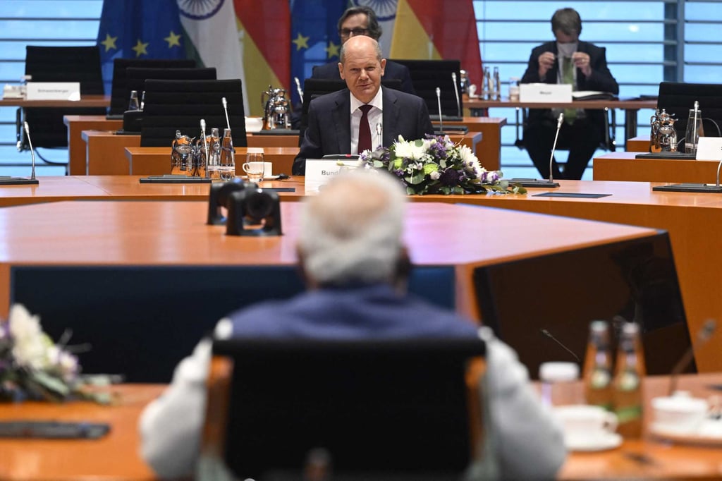 German Chancellor Olaf Scholz sits opposite Indian Prime Minister Narendra Modi before Indo-German governmental consultations at the Chancellery in Berlin on Monday. Photo: AFP