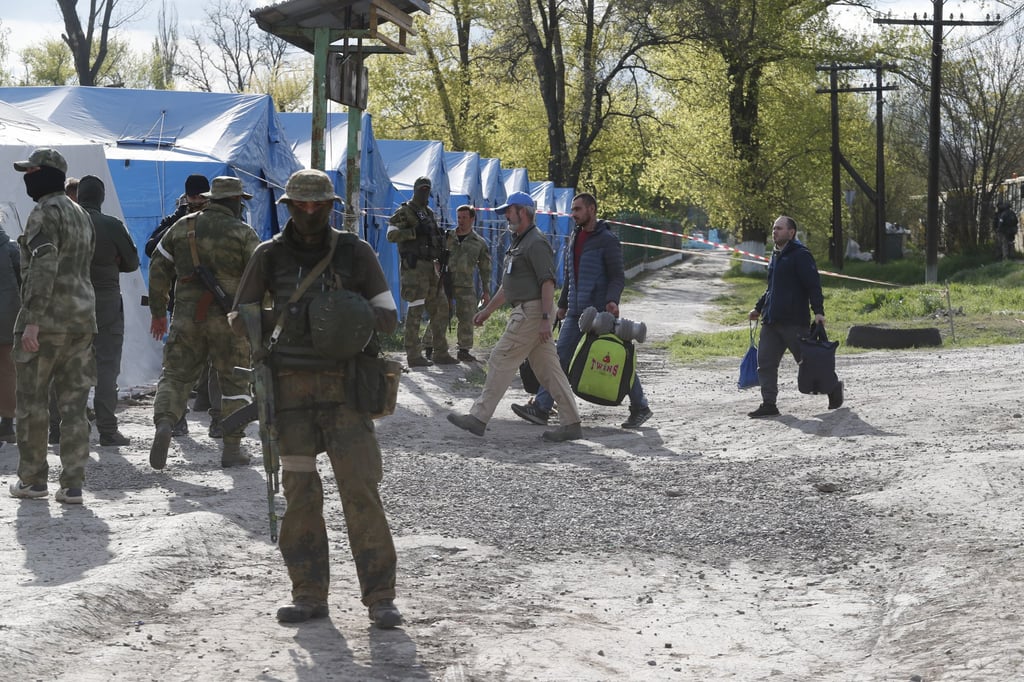 People evacuated from the Azovstal plant and adjacent houses in Mariupol arrive at a temporary accommodation centre in Donetsk on Sunday. Both the Russian and Ukrainian militaries say more than 100 people were evacuated from the besieged city of Mariupol in Ukraine but differ on the exact number and other details. Photo: Xinhua People evacuated from the Azovstal plant and adjacent houses in Mariupol arrive at a temporary accommodation centre in Donetsk on Sunday. Both the Russian and Ukrainian militaries say more than 100 people were evacuated from the besieged city of Mariupol in Ukraine but differ on the exact number and other details. Photo: Xinhua