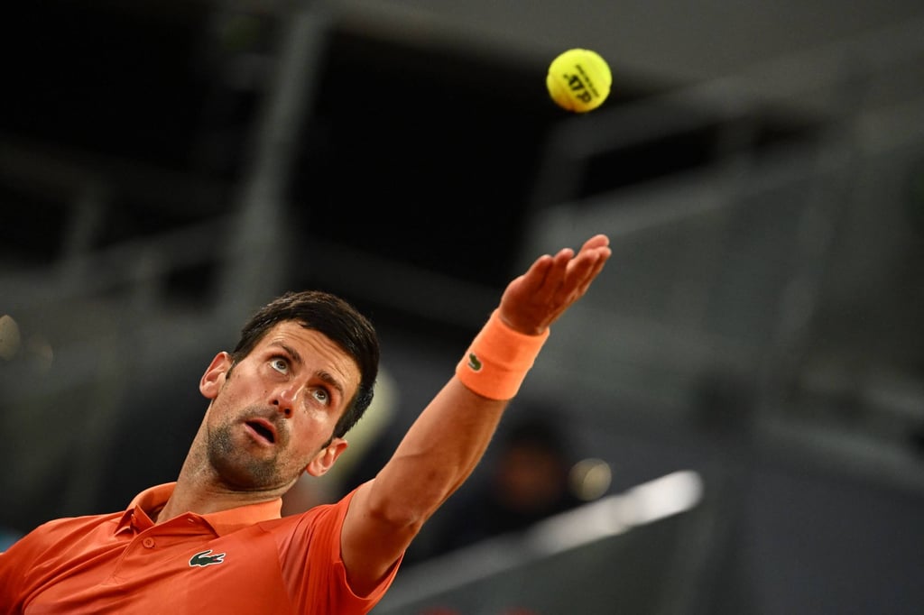 Serbia’s Novak Djokovic serves the ball to France’s Gael Monfils during the Madrid Open. Photo: AFP