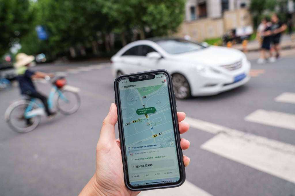 The Didi ride-hailing app on a smartphone in Beijing on Monday, July 5, 2021. The company’s apps have been absent from China app stores since July 2021. Photo: Bloomberg The Didi ride-hailing app on a smartphone in Beijing on Monday, July 5, 2021. The company’s apps have been absent from China app stores since July 2021. Photo: Bloomberg