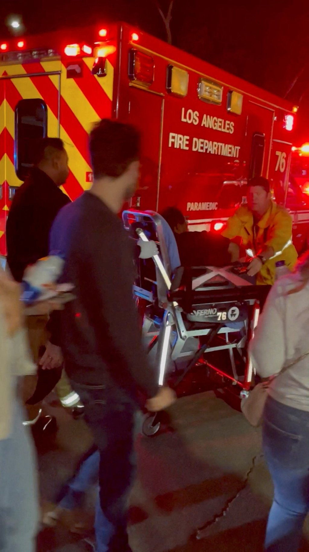 A man is transported into an ambulance after comedian Dave Chappelle was attacked on stage during stand-up Netflix show at the Hollywood Bowl, in Los Angeles on Tuesday. Photo: Theodore Nwajei/via Reuters