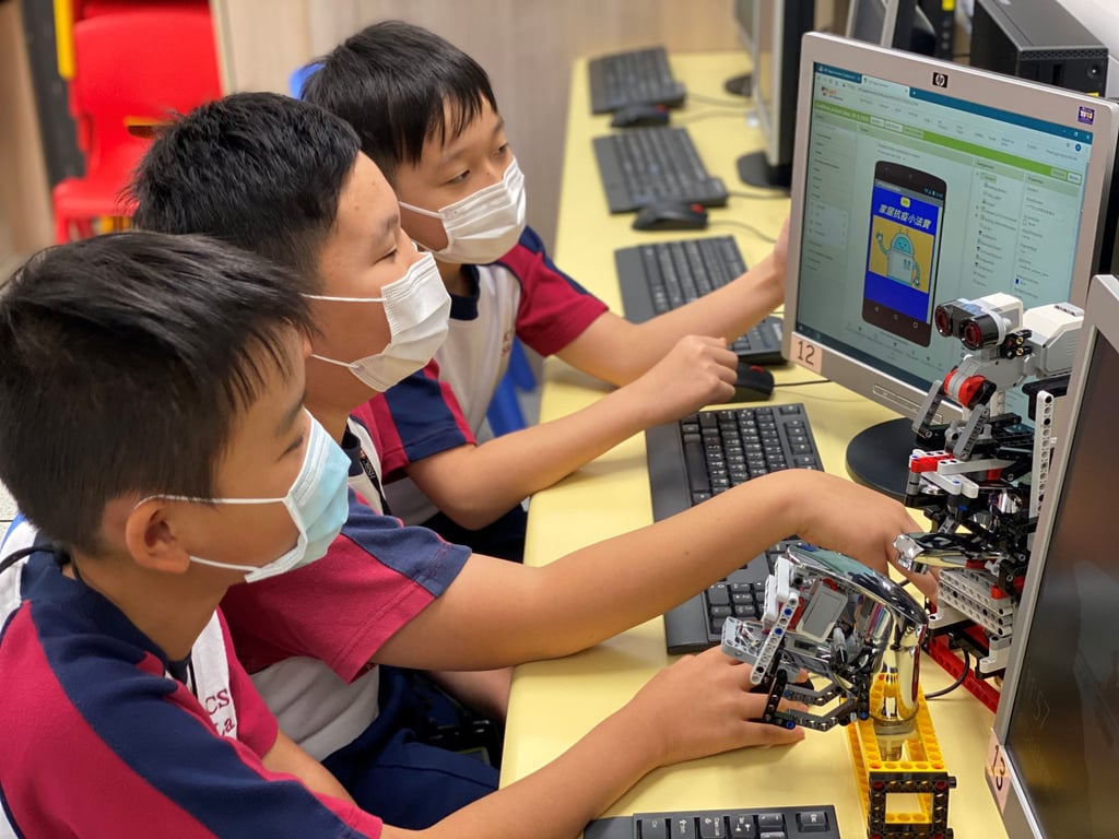 Through the CoolThink@JC programme, students from Chan Sui Ki (La Salle) Primary School are learning problem-solving skills using concepts drawn from computer science. Photo: HKJC