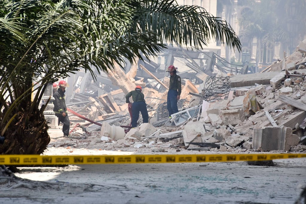 Rescuers search in the rubble after an explosion in the Saratoga Hotel in Havana on Friday. Photo: AFP Rescuers search in the rubble after an explosion in the Saratoga Hotel in Havana on Friday. Photo: AFP