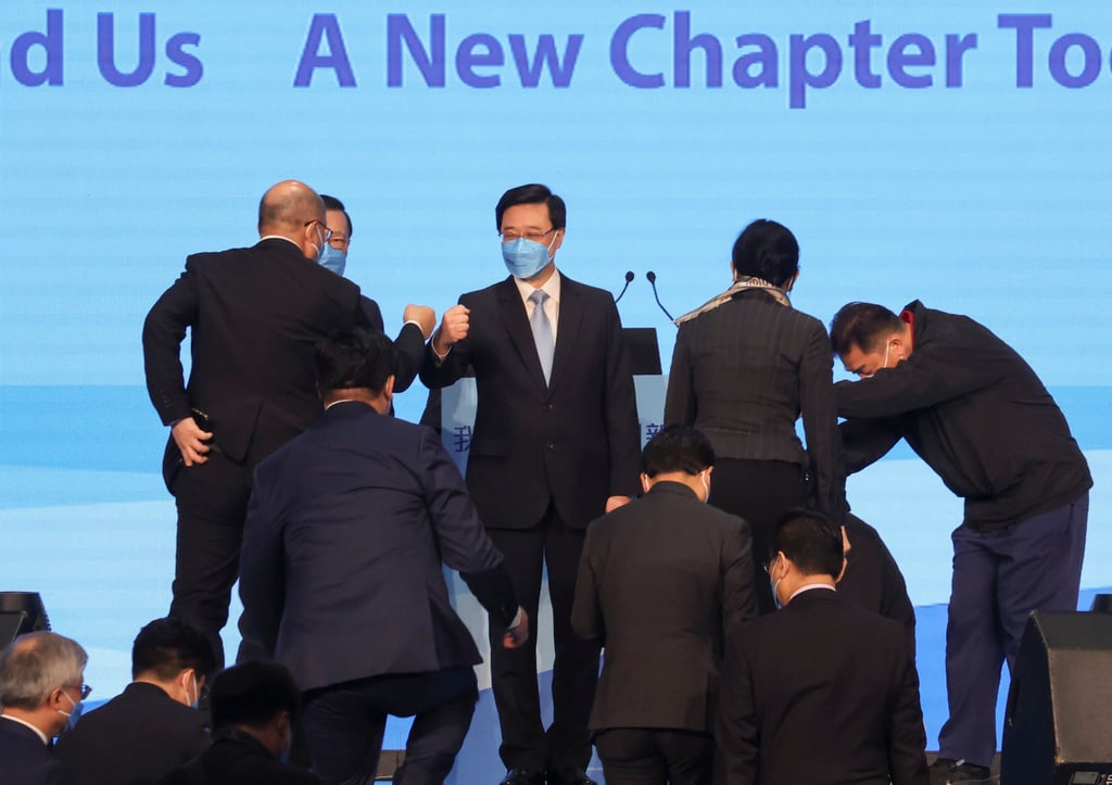 Chief executive candidate John Lee (centre) has promised civil service reforms. Photo: Felix Wong