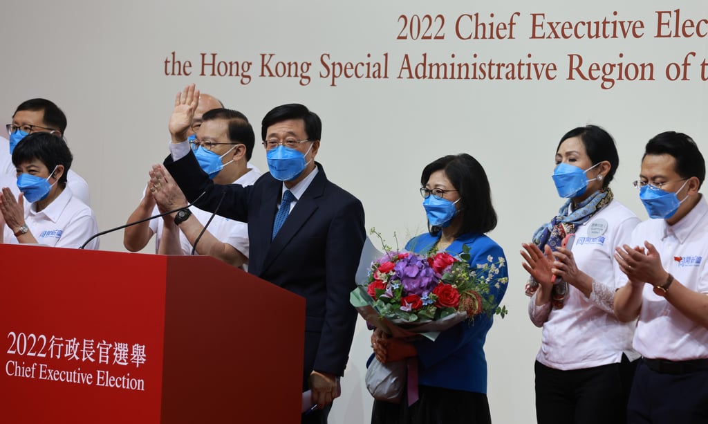 Hong Kong’s chief executive-elect John Lee meeting the press together with his wife, Janet Lam Lai-sim, at the convention centre in Wan Chai on Sunday. Photo: SCMP / May Tse