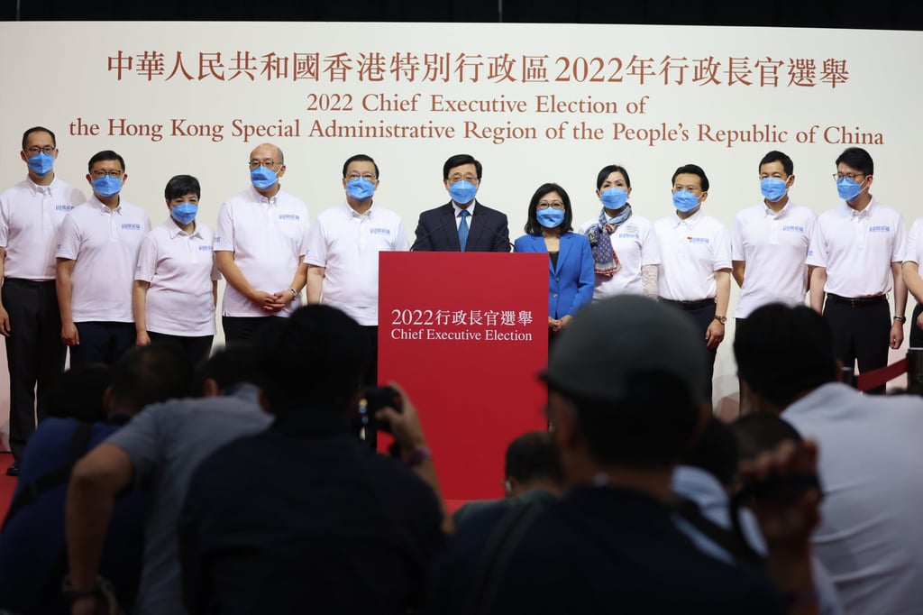 John Lee (centre) after securing 99.2 per cent of votes from the Election Committee on Sunday. Photo: Nora Tam John Lee (centre) after securing 99.2 per cent of votes from the Election Committee on Sunday. Photo: Nora Tam