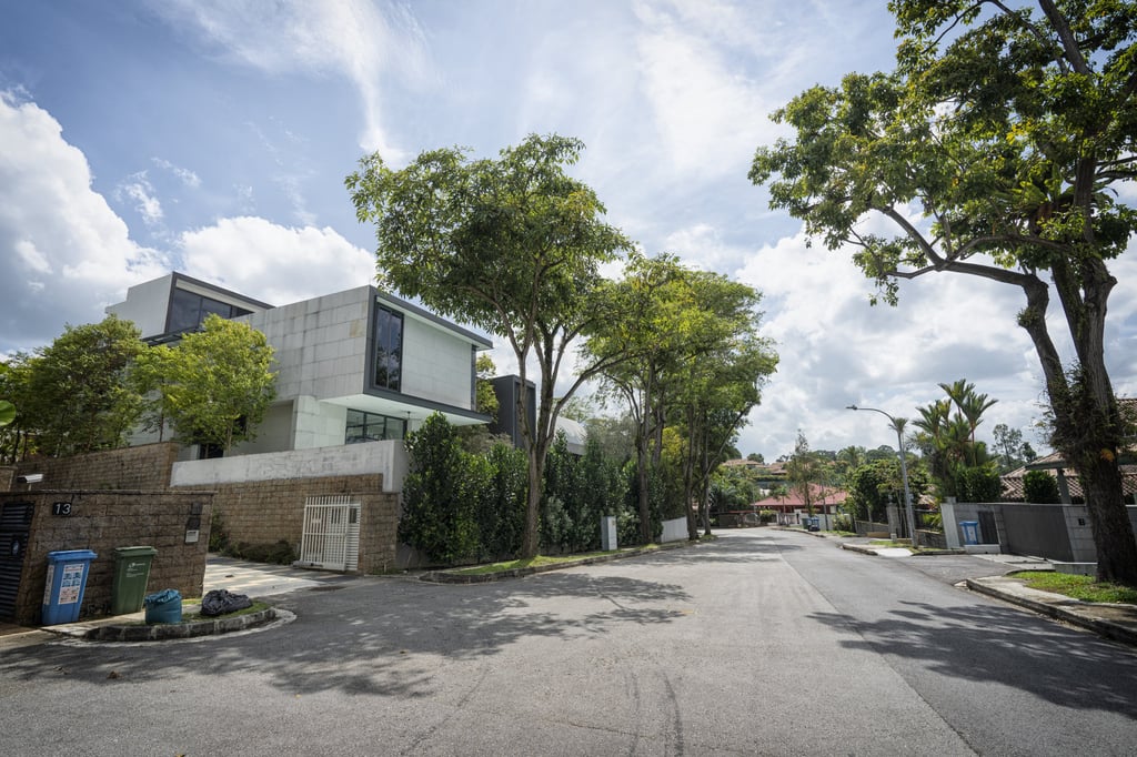 Houses are seen along White House Park, near the Botanic Gardens in Singapore. Sales of high-end bungalows – the city’s equivalent of mansions – tripled in 2021. Photo: Bloomberg
