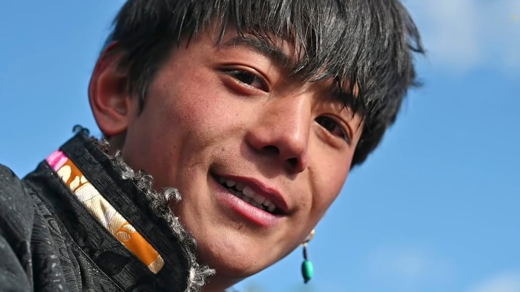 Zhaxi Dingzhen, the 20-year-old Tibetan herdsman from Sichuan became an internet sensation over a viral video showcasing what fans described as his ‘pure smile’ and rugged appearance. Photo: YouTube