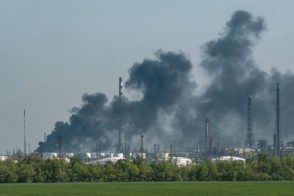 Smoke rises at an oil refinery near Lysychansk on Monday after being shelled on the 75th day of the Russian invasion of Ukraine. Photo: AFP via Getty Images/TNS Smoke rises at an oil refinery near Lysychansk on Monday after being shelled on the 75th day of the Russian invasion of Ukraine. Photo: AFP via Getty Images/TNS
