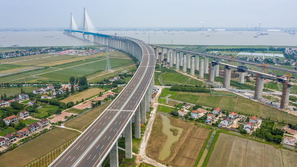 An aerial photograph of an 11-kilometre bridge linking Nantong and Zhangjiagang across the Yangtze River in Jiangsu province, taken on 1 July 2020. Photo: Xinhua.