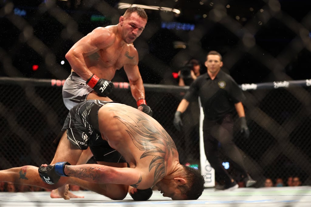 Tony Ferguson falls to the mat after being knocked out by a front kick from Michael Chandler at UFC 274. Photo: USA TODAY Sports