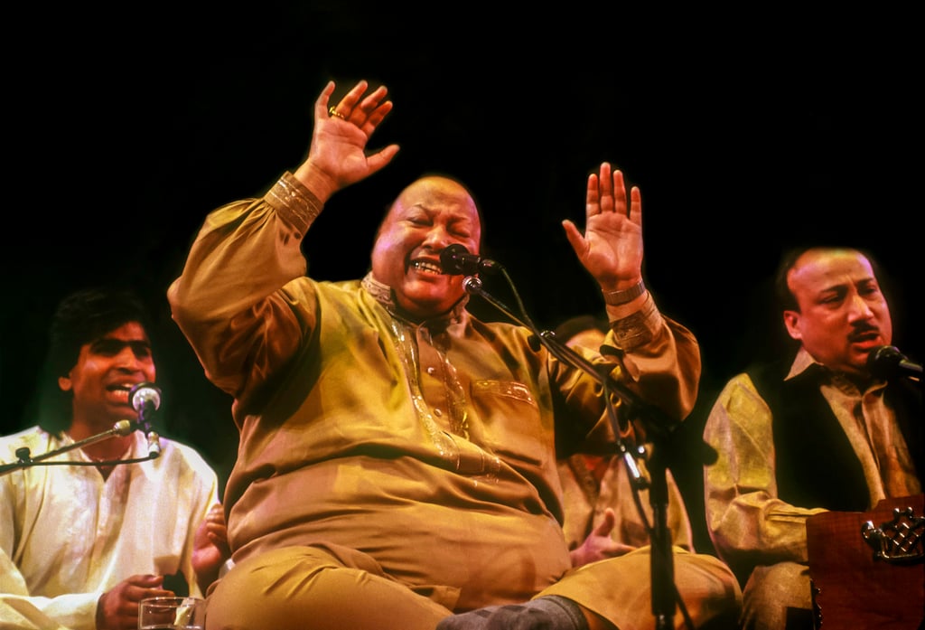 The late Pakistani musician Nusrat Fateh Ali Khan performing in New York in 1995. Photo: Getty Images