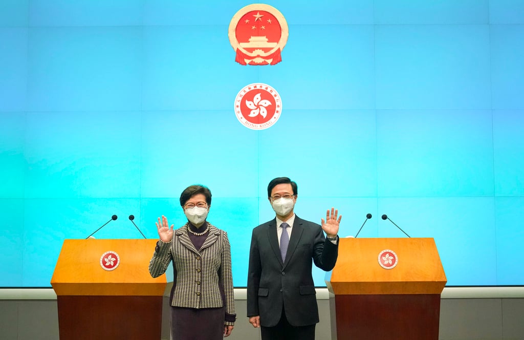 (Left) Hong Kong leader Carrie Lam and her successor John Lee meet the media a day after the latter was voted into the top job. Photo: Sam Tsang