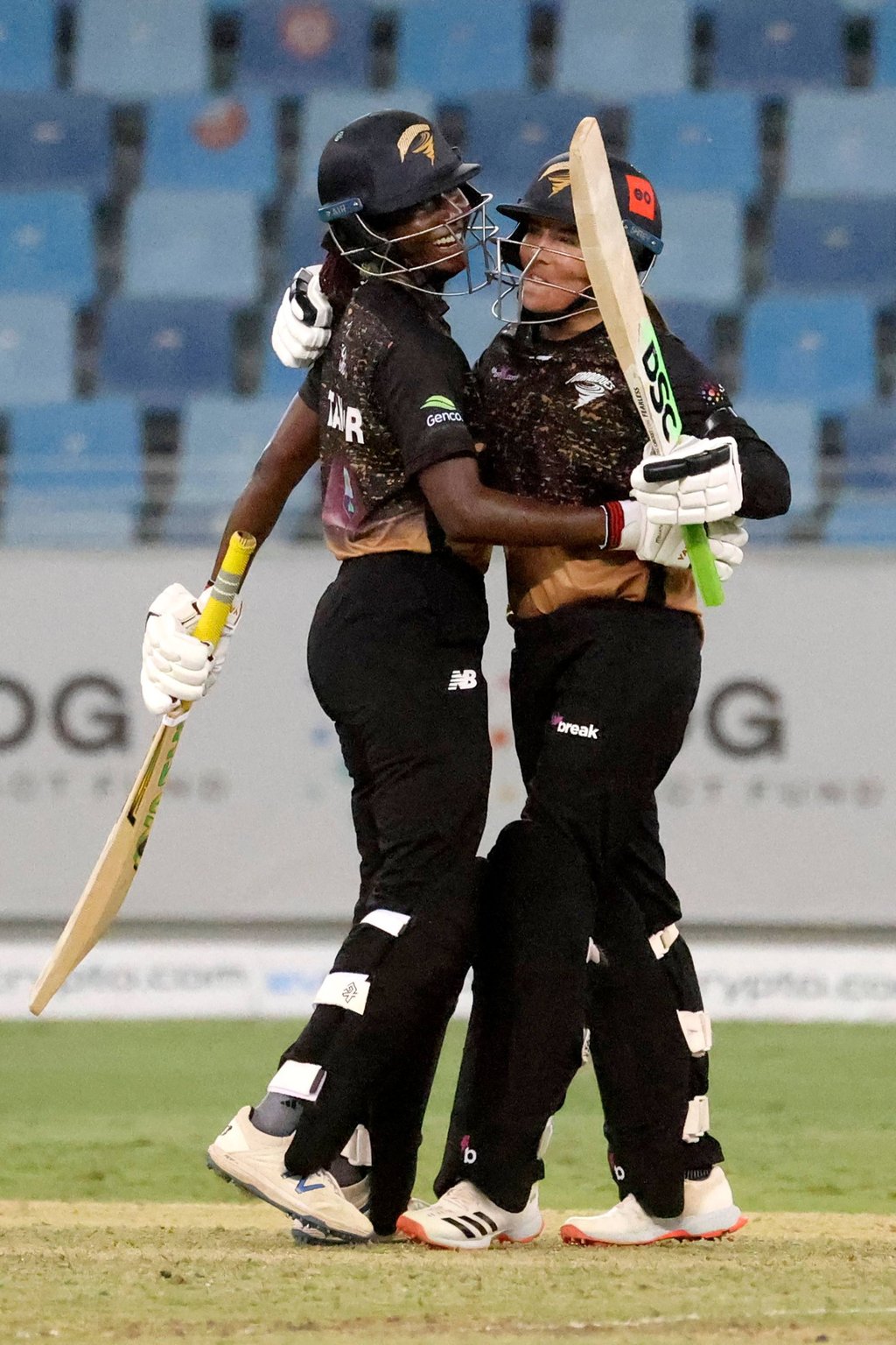 Tornadoes captain Stafanie Taylor (left) celebrates with teammate Sune Luus after their win in the FairBreak Invitational T20 final. Photo: AFP Tornadoes captain Stafanie Taylor (left) celebrates with teammate Sune Luus after their win in the FairBreak Invitational T20 final. Photo: AFP