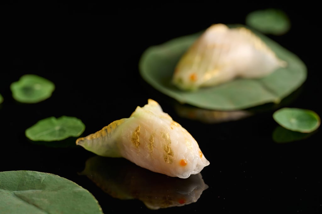 Steamed minced cod fish and shrimp dumpling with soy sauce.