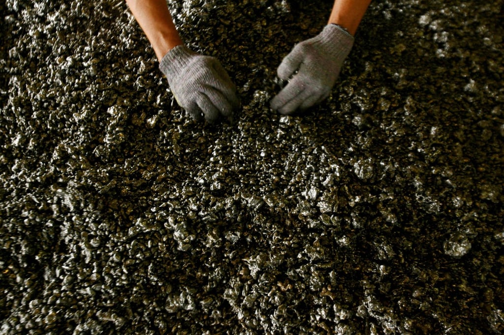 A worker handles nickel ore in a ferronickel smelter in Pomala district, Indonesia. File photo: Reuters A worker handles nickel ore in a ferronickel smelter in Pomala district, Indonesia. File photo: Reuters
