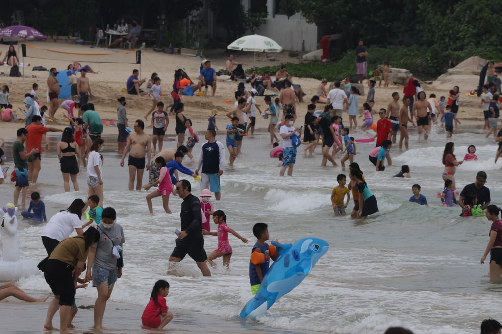 People flock to Shek O Beach earlier this month following the relaxation of social-distancing curbs. Photo: Nora Tam