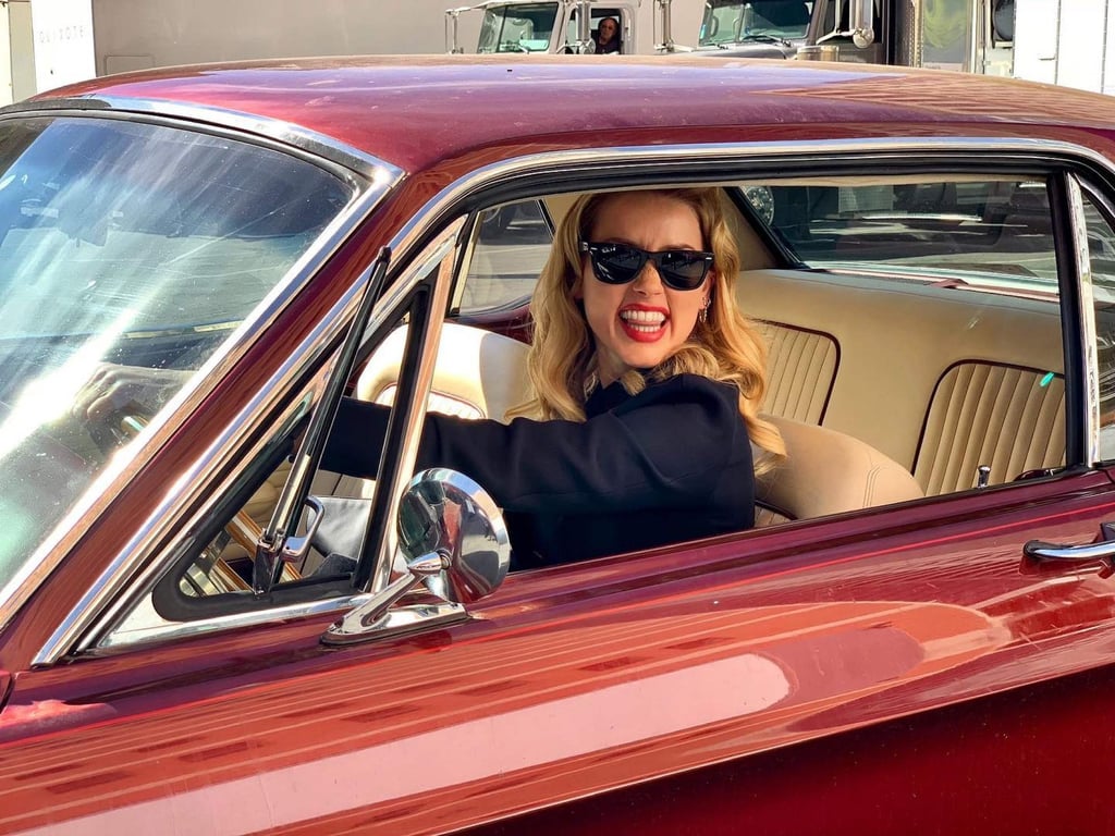 Amber Heard posing with her car. Photo: @amberheard/Instagram