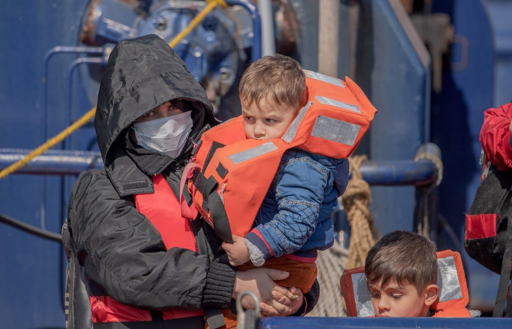 Migrants arrive after crossing the English Channel in Dover, Britain. Under a scheme designed to crack down on migrants landing on British shores after crossing the Channel in small boats, the UK intends to provide those deemed to have arrived unlawfully with a one-way ticket to Rwanda. Photo: EPA-EFE