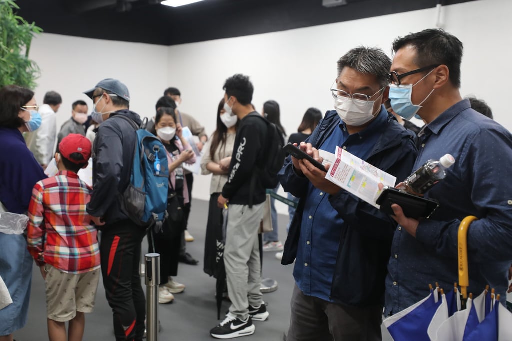 Property buyers gather at Henderson Land’s sales office in Tsim Sha Tsui on May 1, 2022, for a chance to buy a unit in the developer’s The Quinn, Square Mile residential project. Photo: Xiaomei Chen Property buyers gather at Henderson Land’s sales office in Tsim Sha Tsui on May 1, 2022, for a chance to buy a unit in the developer’s The Quinn, Square Mile residential project. Photo: Xiaomei Chen