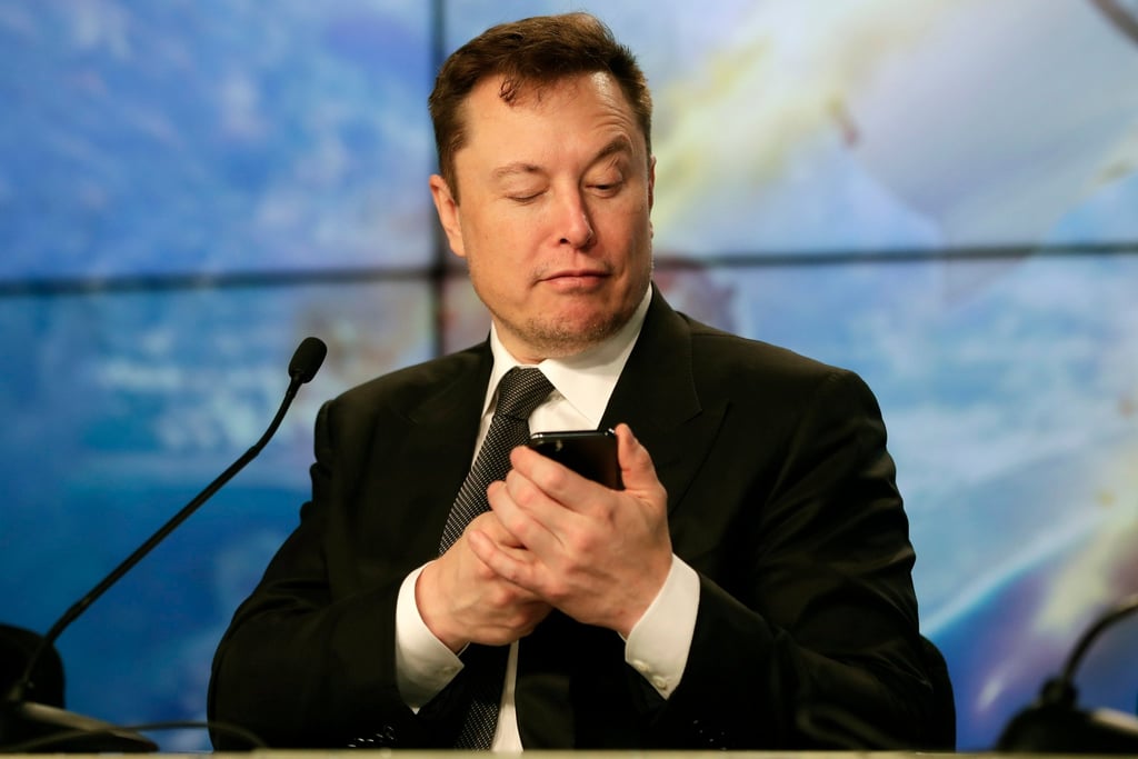 Elon Musk founder, CEO, and chief engineer/designer of SpaceX jokes with reporters during a news conference after a Falcon 9 SpaceX rocket test flight in January 2020. Photo: AP Elon Musk founder, CEO, and chief engineer/designer of SpaceX jokes with reporters during a news conference after a Falcon 9 SpaceX rocket test flight in January 2020. Photo: AP
