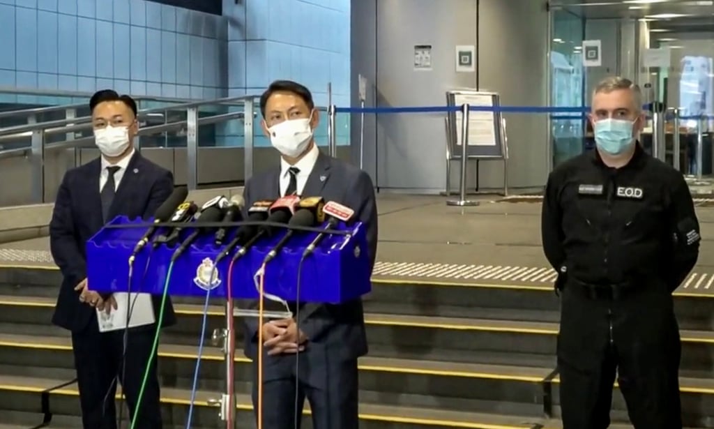 (From left) The cybersecurity and technology crime bureau’s Superintendent Wilson Tam, Superintendent Chan Wui-nang of the organised crime and triad bureau and Alick McWhirter, the force’s senior bomb disposal officer, during a press conference on the arrests. Photo: Handout