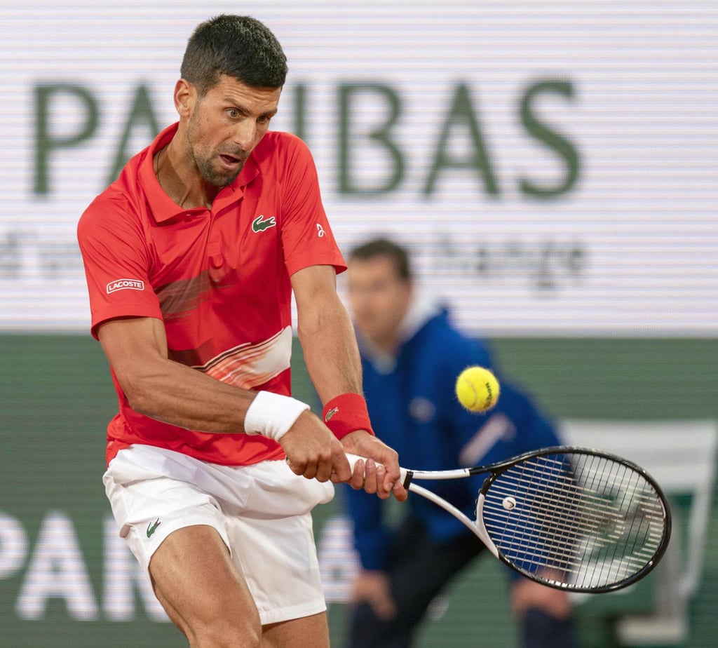 Djokovic of Serbia plays against Yoshihito Nishioka of Japan in the first round of the French Open tennis tournament in Paris. Photo: Kyodo Djokovic of Serbia plays against Yoshihito Nishioka of Japan in the first round of the French Open tennis tournament in Paris. Photo: Kyodo