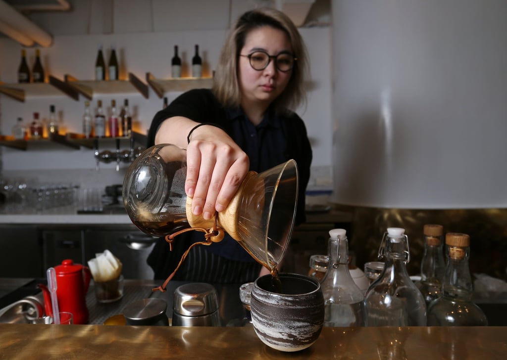 Sophie Chan makes coffee at Interval Coffee in Central. Photo: Xiaomei Chen Sophie Chan makes coffee at Interval Coffee in Central. Photo: Xiaomei Chen