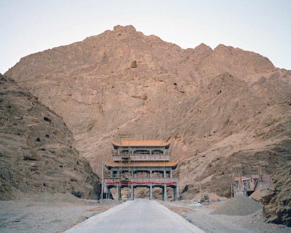 The gate to a Tibetan Buddhist temple in Aguimiao, Dengkou county, in 2014. “In the mountains of Dengkou county in western Inner Mongolia, this road leads to a Tibetan Buddhist temple. The religion is still followed in many parts of the autonomous region.” Photo: Li Wei