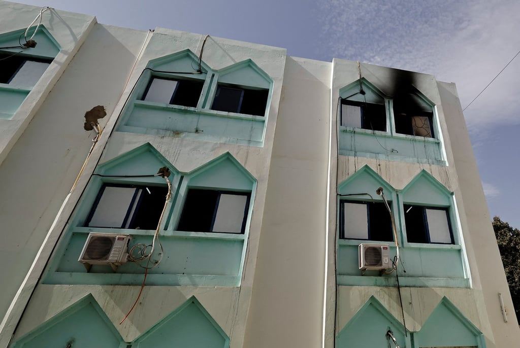 Charred windows are pictures at the hospital on Thursday, where newborn babies died in a fire at the neonatal ward in Tivaouane, Senegal. Photo: Reuters
