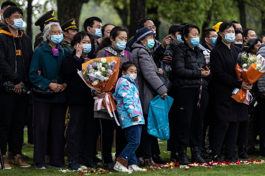 People attend a ‘Covid friendly’ funeral in Wuhan. Photo: Getty Images