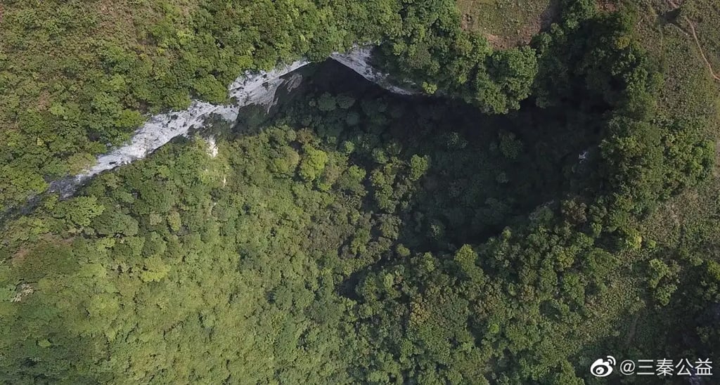 An aerial view of the sinkhole in Guangxi. Photo: Weibo