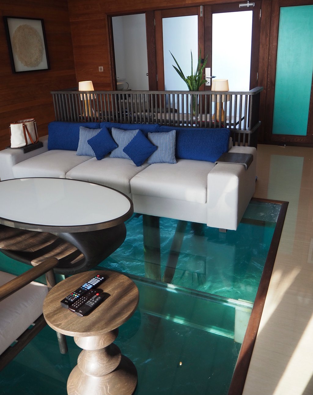 The Conrad Maldives was the first resort to have overwater villas with glass floors. Photo: Mark Footer The Conrad Maldives was the first resort to have overwater villas with glass floors. Photo: Mark Footer