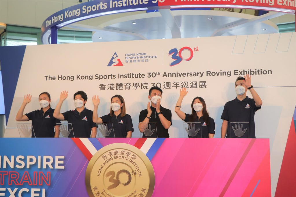 Angus Ng (right) at the HKSI’s 30th Anniversary Roving Exhibition at New Town Plaza with fellow Hong Kong athletes. Photo: Shirley Chui Angus Ng (right) at the HKSI’s 30th Anniversary Roving Exhibition at New Town Plaza with fellow Hong Kong athletes. Photo: Shirley Chui