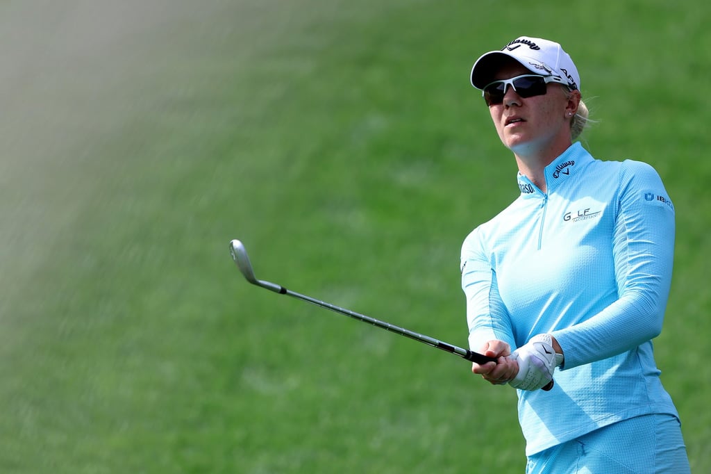 Madelene Sagstrom watches her approach shot on the 9th fairway. Photo: AFP Madelene Sagstrom watches her approach shot on the 9th fairway. Photo: AFP