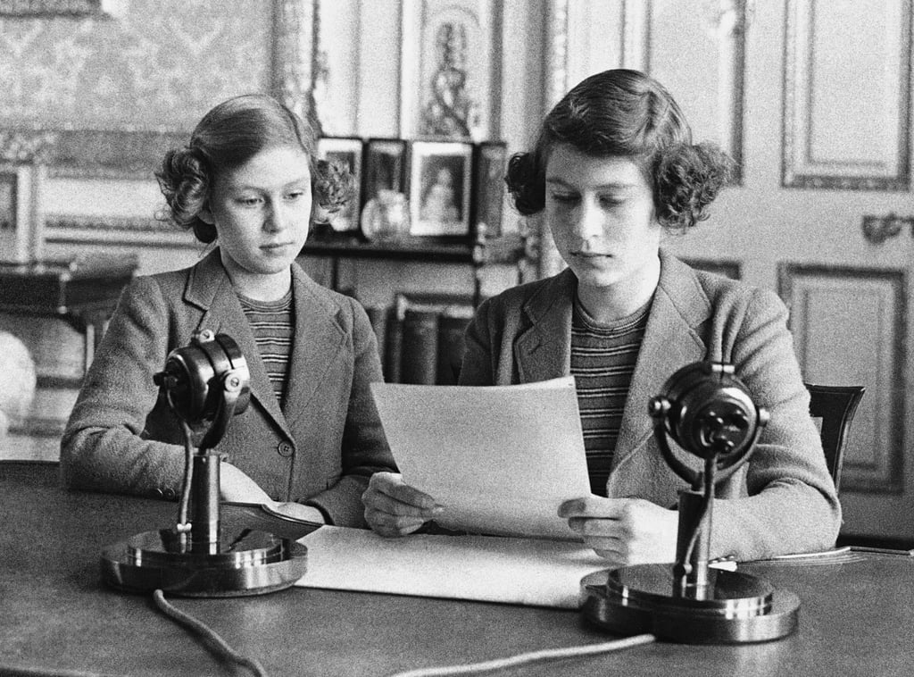 Elizabeth, right, with her sister Margaret before giving her first radio broadcast on October 13, 1940. Photo: AP Elizabeth, right, with her sister Margaret before giving her first radio broadcast on October 13, 1940. Photo: AP
