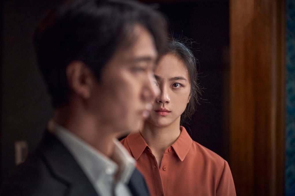 Tang Wei (right) and Park Hae-il in a still from Decision to Leave.