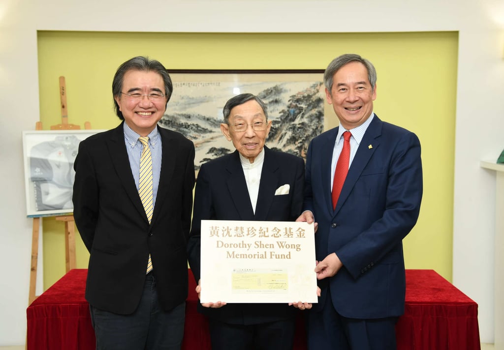 Professor Roland Chin (left) and Dr Clement Chen (right) with Raymond Wong (centre). Photo: Facebook