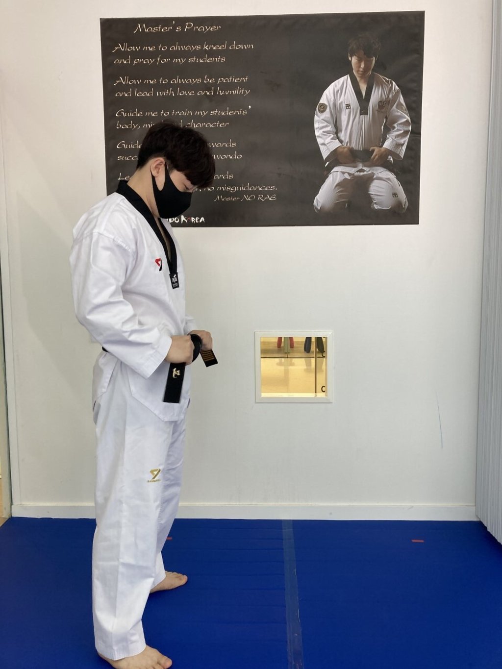 Master No Rae of NRG Taekwondo Korea ties his belt before a class at his centre in Hung Hom. Photo: Kim Bo-eun Master No Rae of NRG Taekwondo Korea ties his belt before a class at his centre in Hung Hom. Photo: Kim Bo-eun