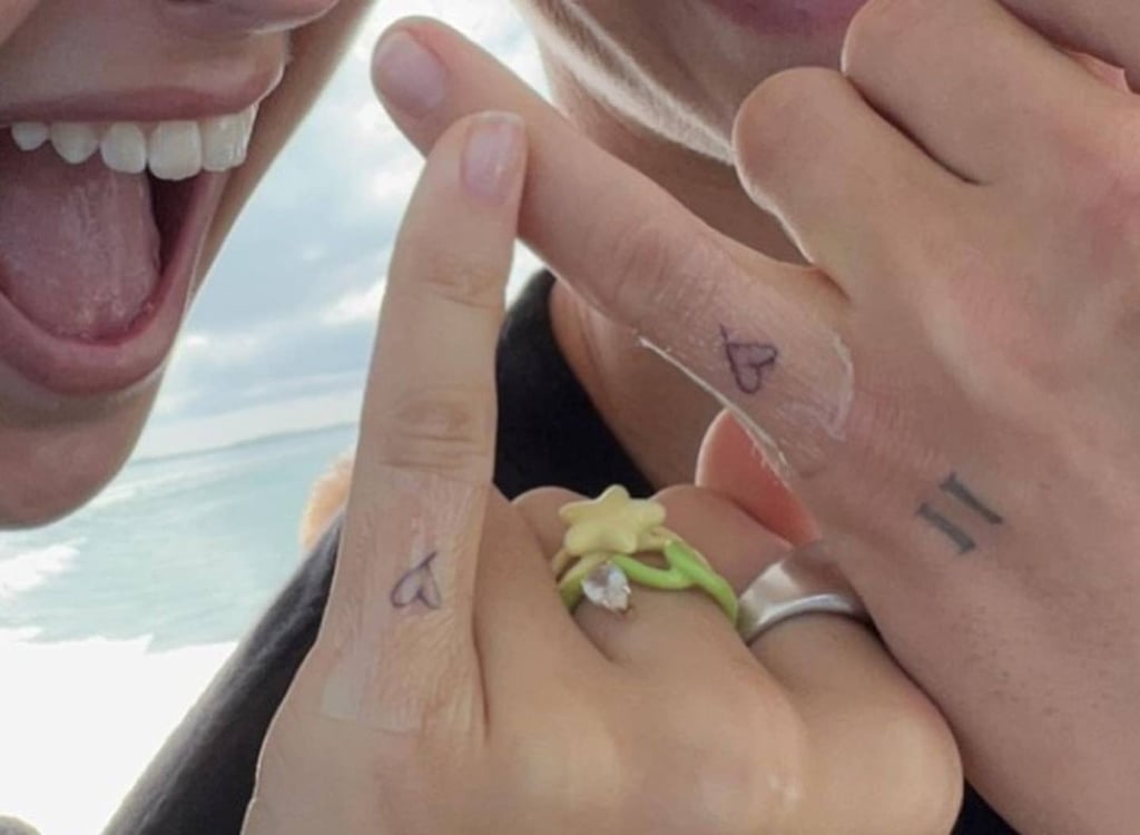 Romeo Beckham and Mia Regan got matching tattoos on their little fingers. Photo: @mimimoocher/Instagram