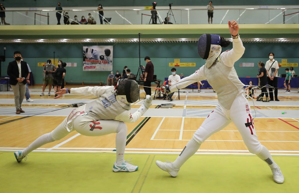 Daphne Chan (right) beat Sophie Wu in the women’s foil final. Photo: Xiaomei Chen Daphne Chan (right) beat Sophie Wu in the women’s foil final. Photo: Xiaomei Chen