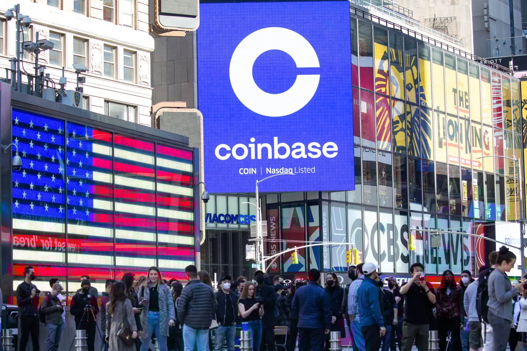 Monitors display Coinbase Global’s signage during the company’s initial public offering at the Nasdaq Stock Market in New York on April 14, 2021. Coinbase is the largest US-based cryptocurrency exchange. Photo: Bloomberg