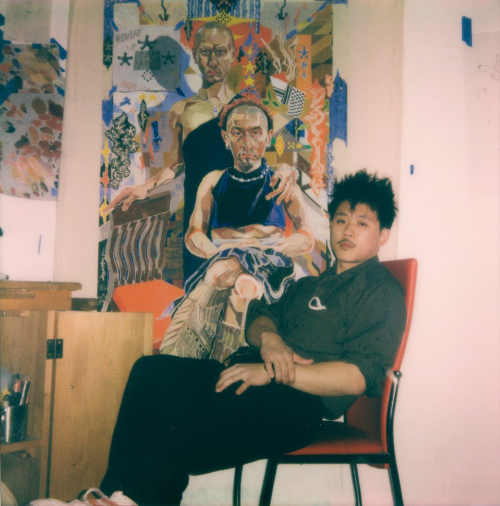 Hou in front of his painting “The siblings in my studio, aka: Gemini, Sagittarian” (2021). Photo: Oscar yi Hou Hou in front of his painting “The siblings in my studio, aka: Gemini, Sagittarian” (2021). Photo: Oscar yi Hou