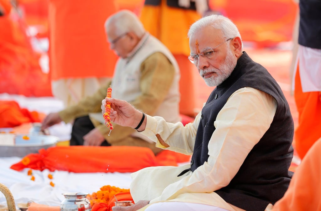 Indian Prime Minister Narendra Modi, front, has stayed largely silent about attacks on Muslims since he came to power. Photo: AP